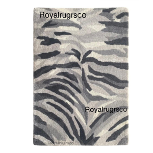 1 hand-tufted rug